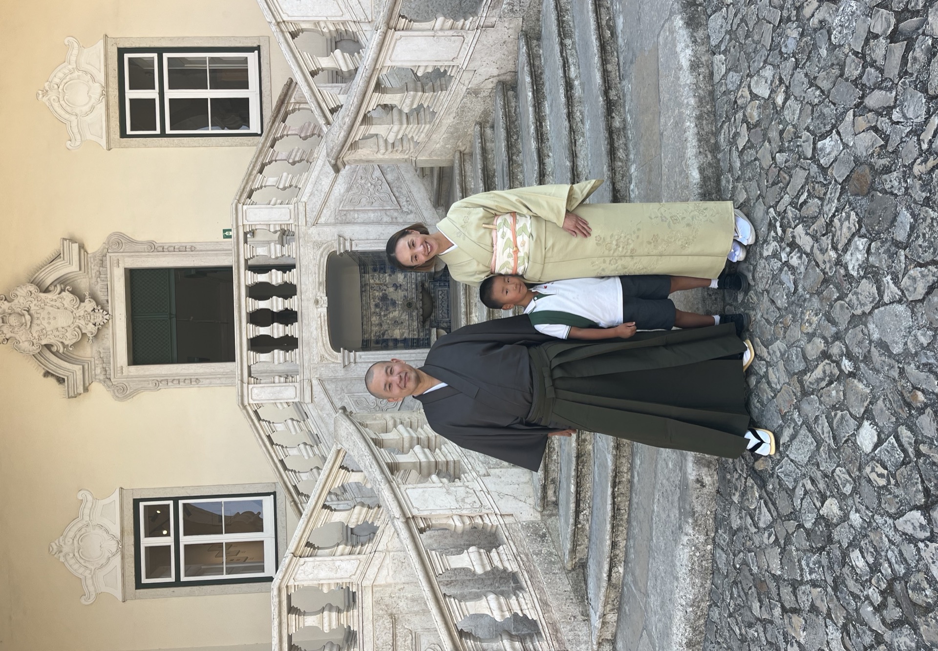 Art of Nippon family in traditional kimono at historic Lisbon location