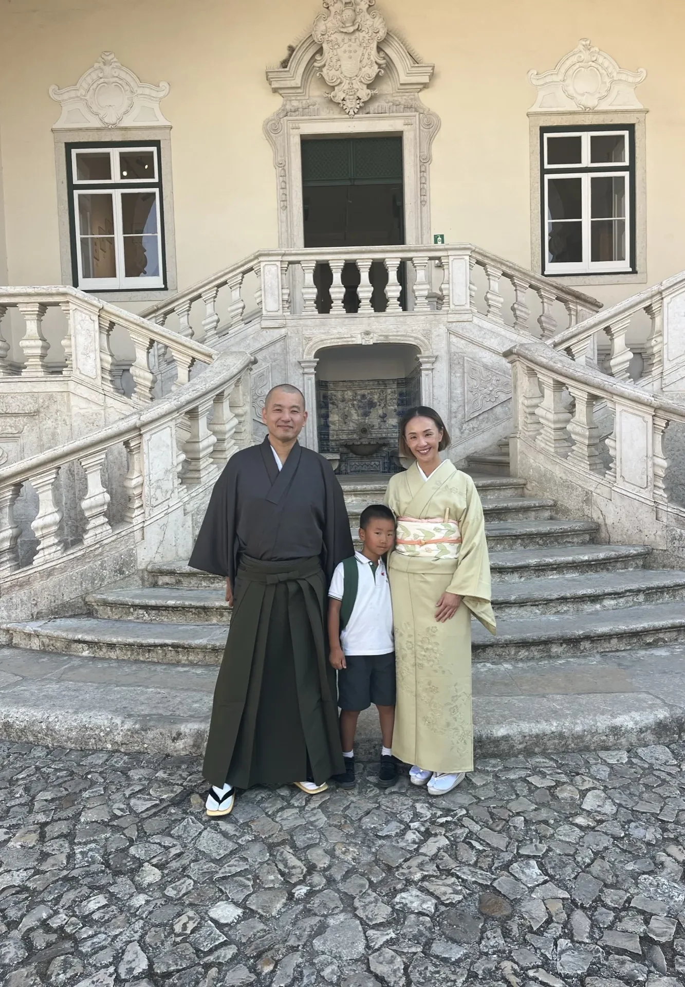 Art of Nippon family in traditional kimono at historic Lisbon location